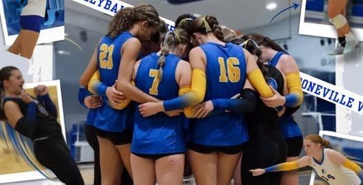 Booneville volleyball players huddle during the 2026 season
