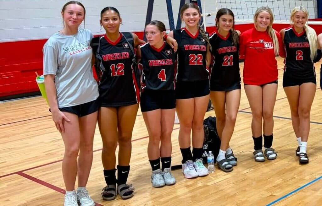 Wheeler Lady Eagles volleyball players pose for a team photo during the 2026 season